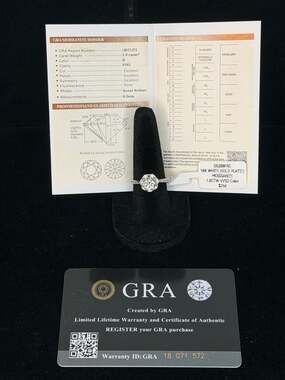 1.0CTW Floral Halo Moissanite Ring in 18K White Gold Plating